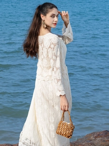 Bohemian white long-sleeve crochet lace dress with hollow floral patterns for beach vacation