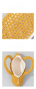 Macro detail of handmade wooden bead handbag with durable white fabric lining