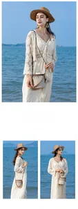 Detail of woven straw bucket bag with tassels showing crossbody and shoulder carrying styles
