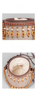 Close-up of ethnic straw bucket bag with sunflower charm, tassel, and beaded strap details