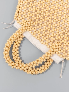 Handmade yellow wooden bead tote bag for beach vacation with drawstring linen lining