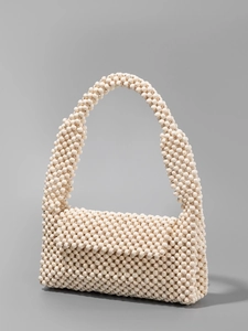 Minimalist cream white handmade wooden bead woven underarm bag with sturdy round handle