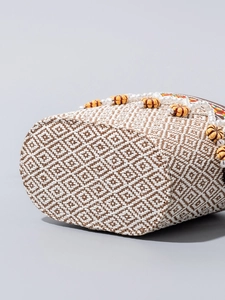 Ethnic woven beach shoulder bag with geometric patterns and pearl beaded strap