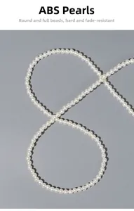 Detail of high-quality ABS imitation pearl chain with smooth finish and elegant luster
