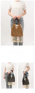 Detail of handmade wooden bead bag featuring fringe tassels and woven inner liner