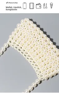 Detailed view of woven pearl shoulder bag interior capacity for phone and cosmetics