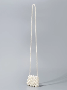 Handmade white faux pearl woven crossbody bag with elegant shoulder strap for women