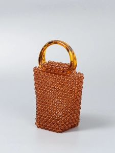 Borsa a mano artigianale con perline ambrate e manico in finto guscio di tartaruga