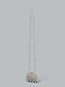Handmade silver beaded hollow mini crossbody bag with industrial metallic finish for beach