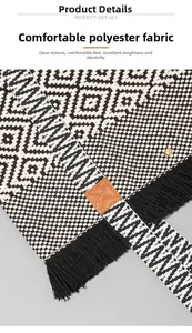 Detail of jacquard polyester fabric with tassel fringe and brown leather patch on tote bag