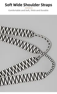 Close-up of wide woven shoulder strap with black and white geometric pattern