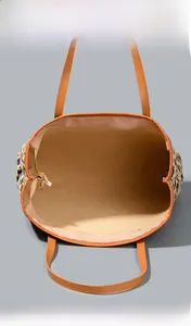 Top view of spacious leopard print tote bag interior with zipper and light lining