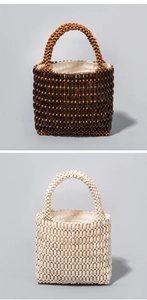 Detail showing handcrafted wooden bead tote bags in dark brown and ivory cream styles