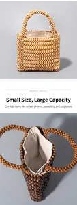 Detail of wooden bead handbag showing spacious interior for phone and cosmetics