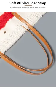 Dettaglio della borsa con frange rosse e bianche, tracolla in pelle PU e rivetti dorati