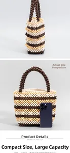 Detail view of a handcrafted beaded handbag with stripes and internal fabric lining