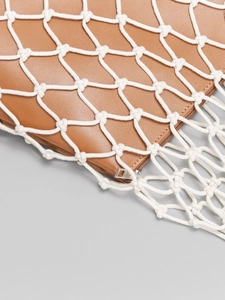 Handwoven cotton net bag with brown leather pouch for beach vacation and summer style