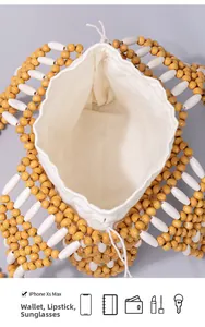Top view of wooden bead woven bag with white canvas pouch showing interior storage space