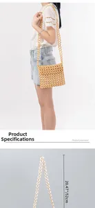 Detail view of handmade wooden bead shoulder bag showing 52cm strap length dimension