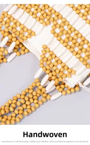 Detailed macro view of handwoven yellow and white beads with a durable drawstring canvas lining