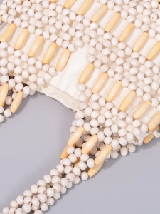 Handmade woven wood bead handbag with maple beads and cream canvas lining