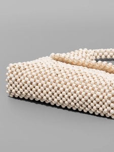 Handcrafted white wooden bead woven shoulder bag with minimalist rectangular design