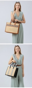 Detail of woven straw tote bags with bohemian patterns and stylish leather handles