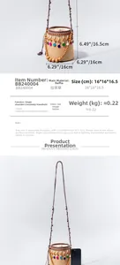 Detailed size chart showing a 16x16.5cm straw bucket bag with colorful pompom details