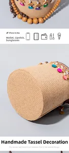 Detail view of woven straw bucket bag with colorful beads and wooden tassel ornaments
