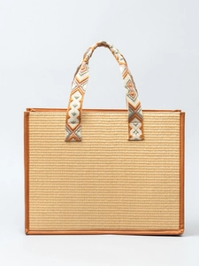 Handwoven straw tote bag with colorful ethnic embroidery straps and leather trim