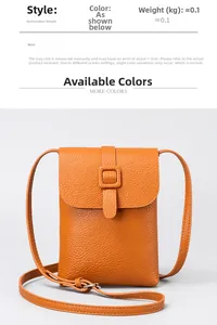 Detail der orangefarbenen Mini-Umhängetasche aus Leder mit Magnetverschluss-Design