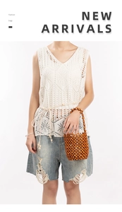 Detailed view of the handcrafted brown wooden bead woven bucket bag for summer travel