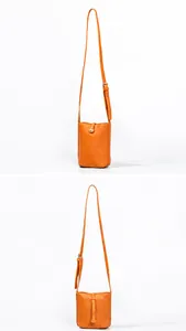 Vistas detalladas del bolso naranja para móvil en cuero PU con textura de grano litchi