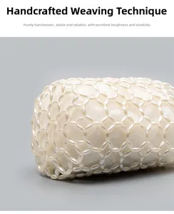 Close-up of handmade pearl beaded shoulder bag showing hollow diamond mesh structure