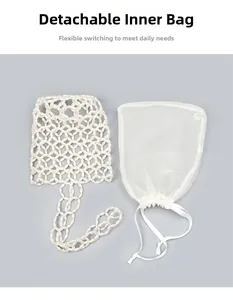 Detail of handmade pearl beaded shoulder bag with removable white mesh drawstring inner bag
