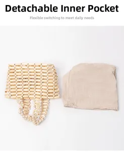 Detail view of woven beaded handbag featuring a practical detachable cotton inner pouch