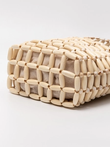 Handmade hollow wood bead tote bag with contrasting textures and cotton linen lining
