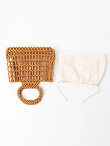 Handmade woven wooden bead handbag with round top handles and a cream drawstring inner pouch