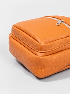 Orange lychee grain PU leather crossbody bag with premium silver metal zipper hardware