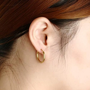 Classic gold hoop earrings set for women featuring high-polished minimalist finish
