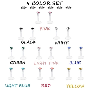 Dettaglio di un set da 9 pezzi di piercing per labbra in acrilico con strass colorati misti