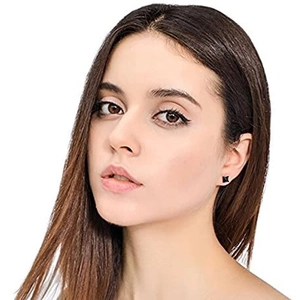 8-piece black stud earrings set with zircon stones shown on a model's ear