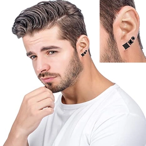 Detail view of 8-piece black stud earring set on ear featuring round and square designs