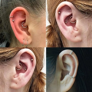 Silver criss-cross ear cuffs and stud earrings set shown on ear in four grid views