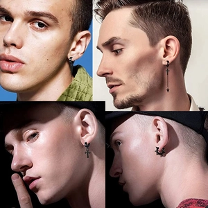 Collection of black stainless steel earrings featuring cross, arrow, and punk style charms