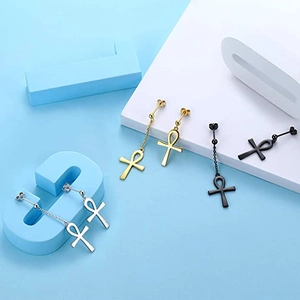 Three pairs of Ankh cross drop earrings in gold, black, and silver stainless steel
