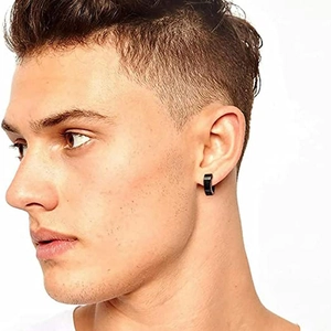 Classic black stainless steel hoop earring for men shown on male model earlobe