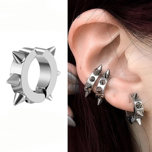 Silver punk stainless steel ear cuff featuring sharp conical rivets with a polished finish