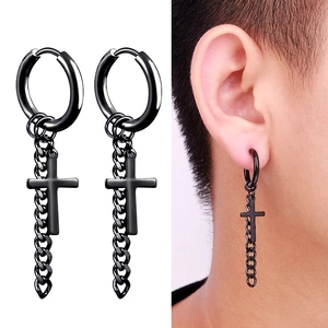 Black punk hoop earrings with cross pendant and chain detail shown on model and white background