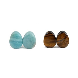 Detailed close-up of teardrop stone ear plugs in light blue amazonite and tiger eye brown